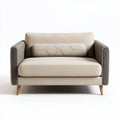 Two-seater fabric sofa with decorative cushion in beige and gray colors